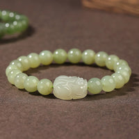KarmaRipple's Authentic Hetian Jade PiXiu Carved Fortune Bracelet