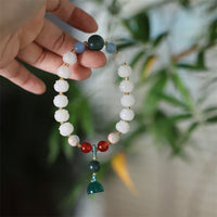 KarmaRipple's Bodhi Seed Lotus Bead Carved Peace Balance Bracelet
