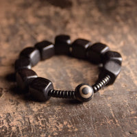 KarmaRipple's Tibetan Ebony Wood Dzi Bead Strength Bracelet