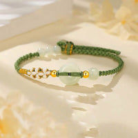 KarmaRipple's Hetian Jade Peace Buckle Fortune Peach Blossom Woven Bracelet